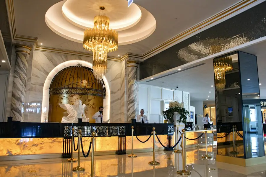Hotel lobby with a gold chandelier